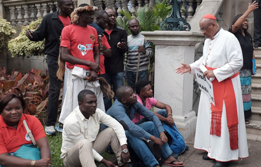 13.-Cardinal-Wilfred-Napier-R-Head-of-the-Catholic-Church-in-South-Africa-speaks-to-foreign-nationals-at-a-prayer-vigil-during-an-anti-xenophobia-march Municipality investigating allegations of theft at xenophobia camp