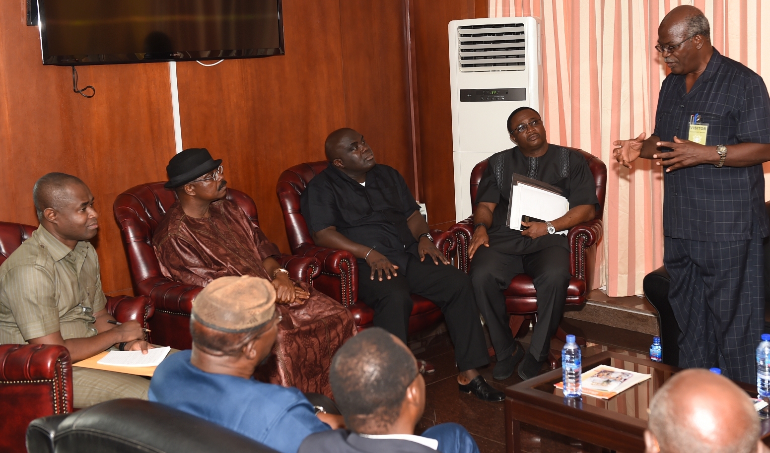 Prof-John-Aheto-making-a-point-to-the-Chief-of-Staff-duirng-the-meeting The family of my uncle Mr Van Lare Dosoo call on Govt